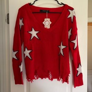 Red sweater with stars size small